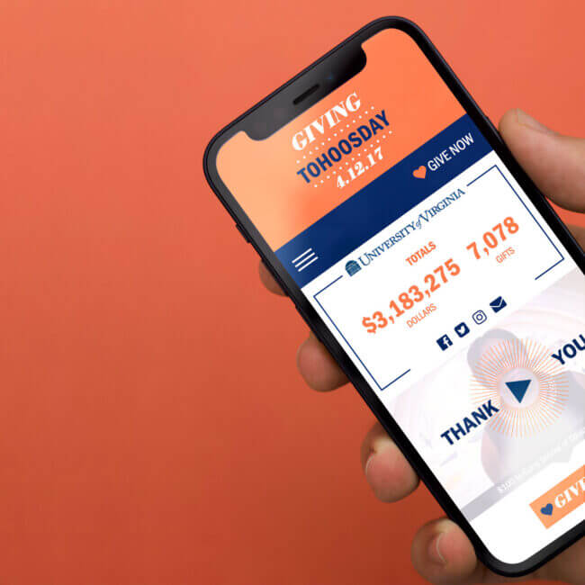 Giving To Hoos Day Website on Phone in Hand